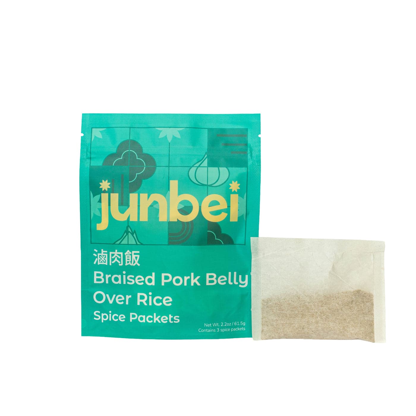 Junbei Braised Pork Belly Over Rice spice packet pouch with a spice packet beside it
